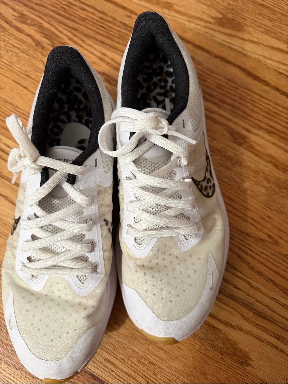 Nike Women’s White Athletic Sneakers with Leopard-Print Swoosh